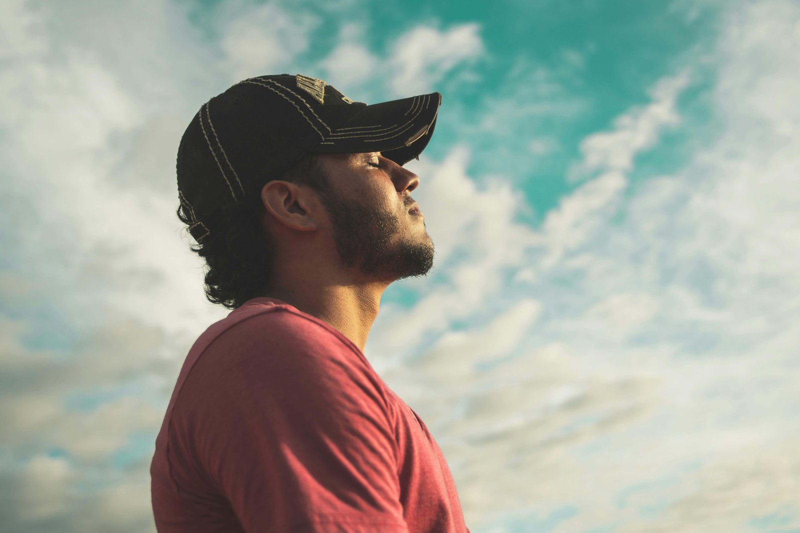 Person practicing meditation to improve mental health.